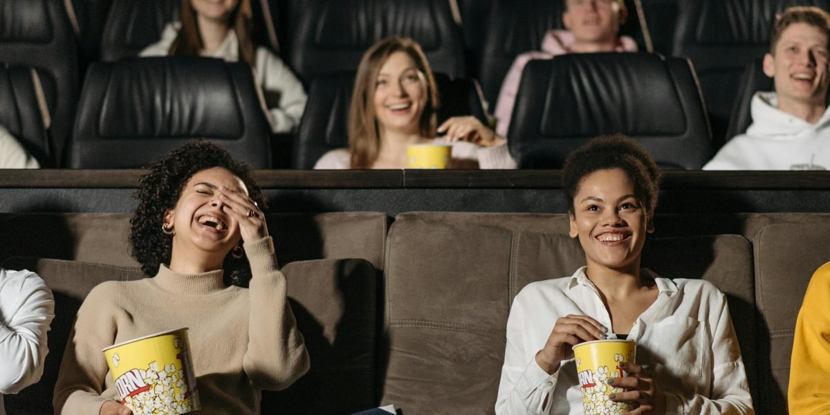 Families enjoying a classic sci-fi film together, embodying the accessible fun of movies like Back to the Future.