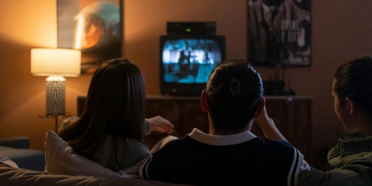 Enthusiastic viewers eagerly await upcoming movie releases, discussing trailers and predictions.