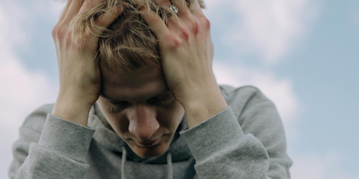 A person expresses frustration or overwhelm while trying to choose from numerous options.