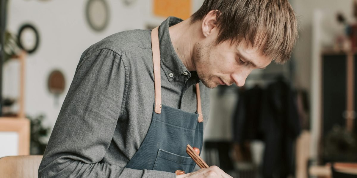 An individual deeply focused and dedicated to mastering a complex skill or craft.
